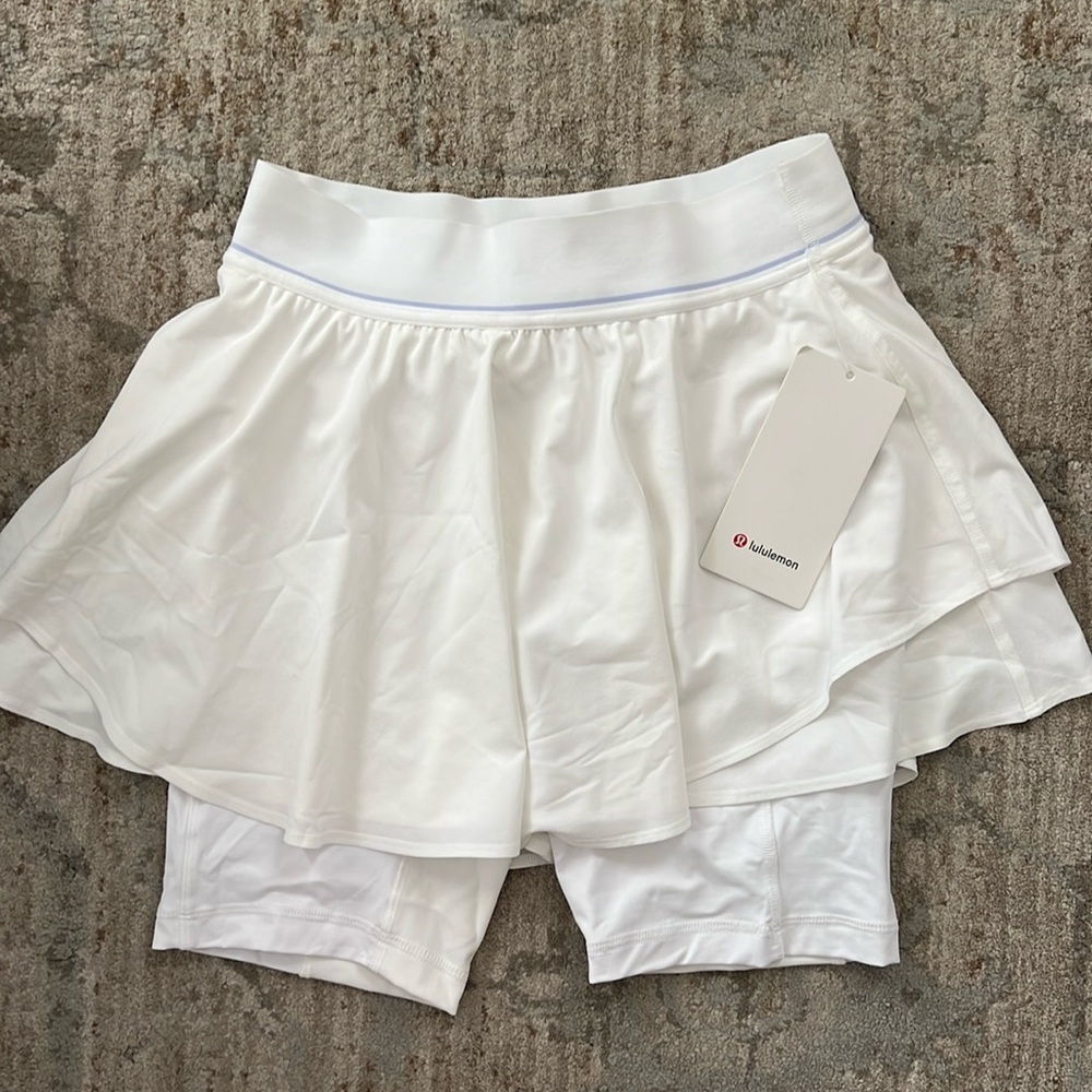 Lululemon size 6 white tennis skirt. Brand new with tags